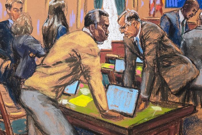 Sean Combs and his attorney Marc Agnifilo discuss with other defense lawyers on how to respond to a new note sent by jurors, during Combs' sex trafficking trial in New York City on Tuesday in this courtroom sketch.
