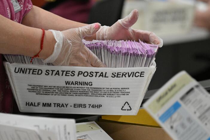 In this file photo, election workers prepare mail-in ballots for tallying at the Los Angeles County Ballot Processing Center on the eve of Election Day, November 4, 2024, in City of Industry, California.
