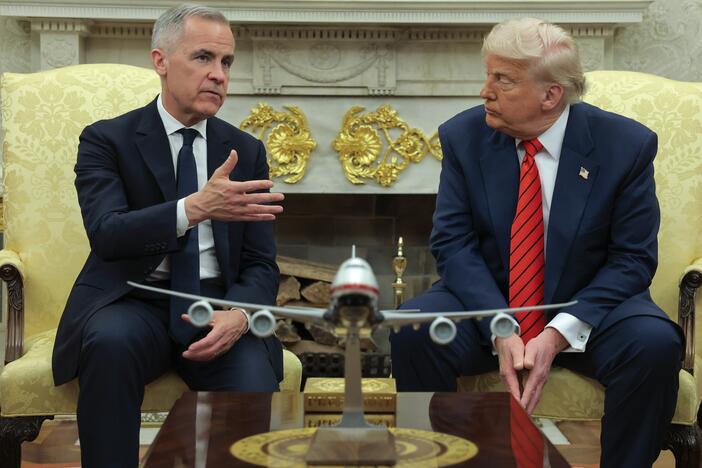 President Trump meets with Canadian Prime Minister Mark Carney in the Oval Office at the White House in Washington, D.C., on May 6, 2025. Carney's government said on Sunday it would scrap a tax on U.S. tech companies after Trump threatened higher tariffs on Canadian goods.