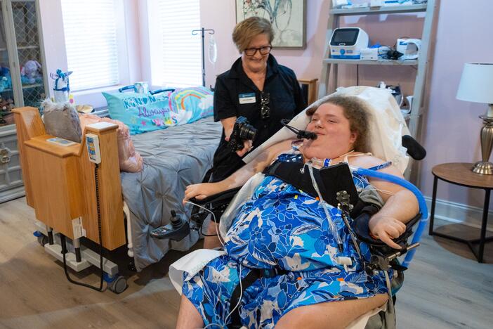 Alexis Ratcliff, 19, (right) moved into her own apartment this week after living in a North Carolina hospital since she was 13. She was a baby when a car accident left her with significant disabilities.