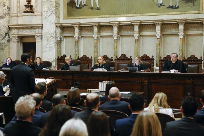 The Wisconsin Supreme Court listens to arguments during a redistricting hearing at the state Capitol, Nov. 21, 2023, in Madison, Wis. The court decided Wednesday, July 2, 2025, that the state's 176-year-old law does not ban abortion.