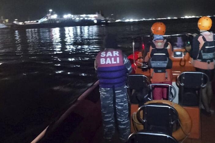 In this photo released by the Indonesian National Search and Rescue Agency (BASARNAS) rescuers search for victims after a ferry enroute for the resort island of Bali sank off Ketapang, East Java, Indonesia on Thursday.