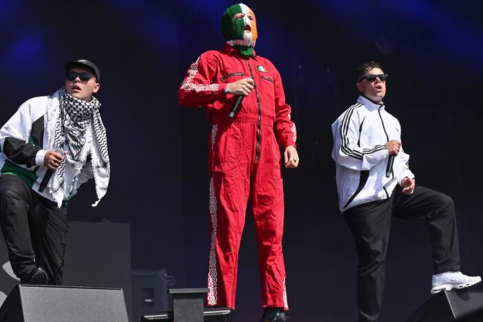 Mo Chara, DJ Próvaí and Móglaí Bap of Kneecap during day four of Glastonbury festival.