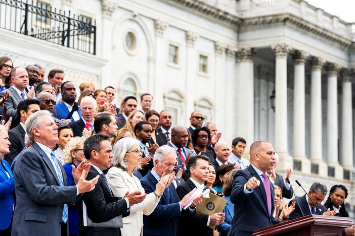 House Minority Leader Hakeem Jeffries, D-N.Y., along with the House Democratic Caucus, assemble on the Capitol steps to rail against President Trump's signature bill of tax breaks and spending cuts on July 2.