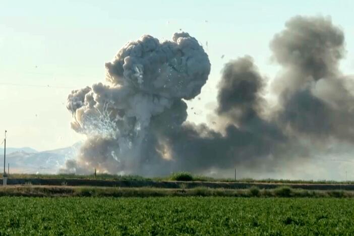 In this image taken from video, smoke and flames rise from a fireworks warehouse explosion on  July 1 in Esparto, Calif.