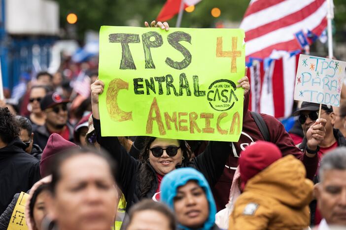 Demonstrators march in Washington, D.C. to demand Temporary Protected Status for Nicaragua, Honduras, Guatemala, and El Salvador on May 1, 2023.