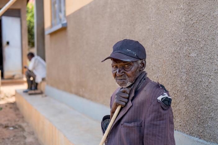 Ukura Midar, 88, had to leave his family's house in 2017 because of construction for a new pipeline project. Now living in a settlement called Kyakaboga, 15 miles from the place he had called home for decades, he says that he is cut off from the graves of several family members, including three of his children, which lie behind a fence.