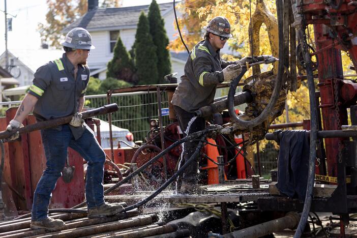 A crew with the company CSR Services works on plugging an orphan well on a homeowner's property in Ashland, Ohio, on October 24, 2024.