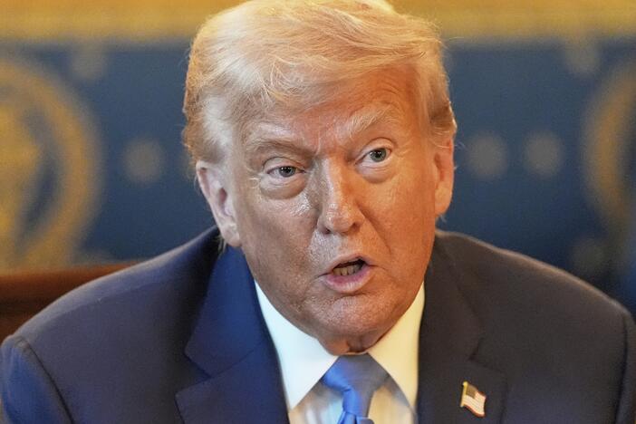 President Trump speaks in the Blue Room of the White House on Monday.