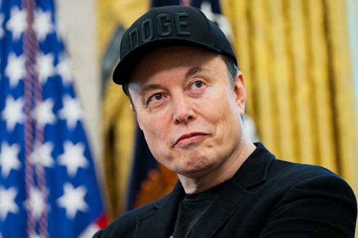 Elon Musk looks on during a news conference with President Trump in the Oval Office on May 30.