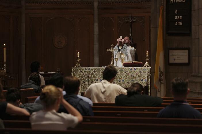A priest during a Mass in Princeton, N.J. Catholic leaders say Mass attendance has dropped as as result of the Trump administration's immigration actions. (AP Photo/Luis Andres Henao)