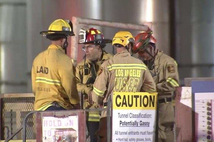 This image taken from footage provided by KABC/ABC7 Los Angeles shows first responders working the scene after a tunnel collapsed on Wednesday, July 9, 2025, in Los Angeles.