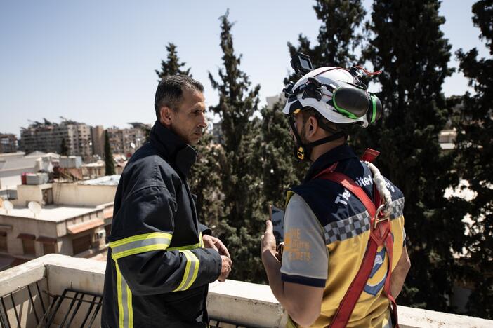Firefighter Naser Brjas and White Helmet member Kinan Ali respond to an emergency call in Damascus on March 31, 2025.