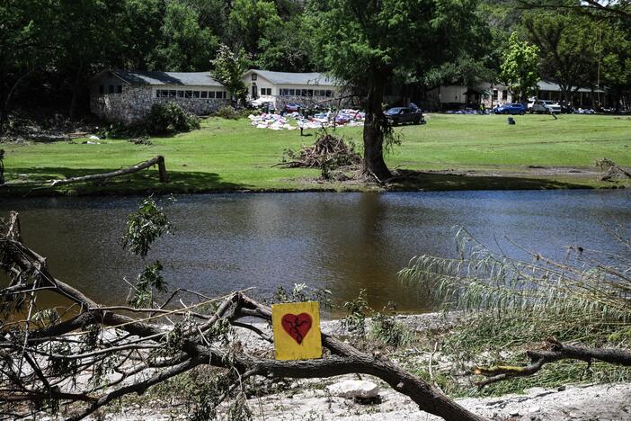 A painted broken heart near Camp Mystic along the Guadalupe River in Hunt, Texas, after more than two dozen campers and counselors were killed in severe flash flooding. New data from First Street, a climate risk modeling company, show a greater risk to the camp buildings compared to FEMA's flood maps.