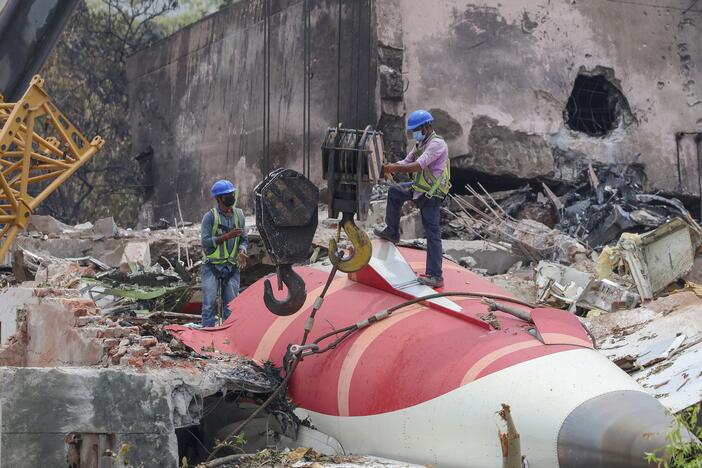 Members of the Indian Army's engineering team prepare to remove the wreckage of an Air India Boeing 787 Dreamliner aircraft, bound for London's Gatwick Airport, which crashed during take-off from an airport in Ahmedabad, India June 14, 2025.