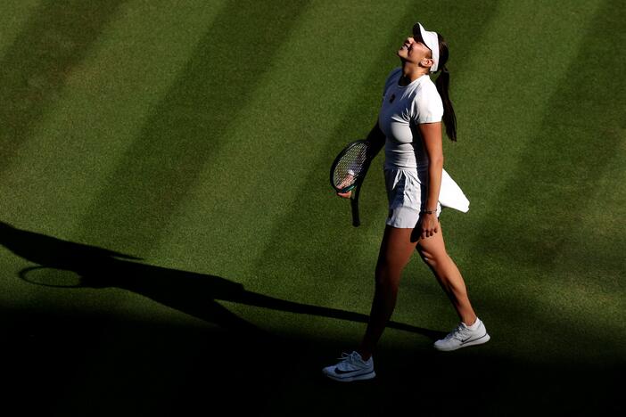 American tennis player Amanda Anisimova celebrates her Wimbledon quarter-final victory against Anastasia Pavlyuchenkova this week at the All England Lawn Tennis & Croquet Club in London.