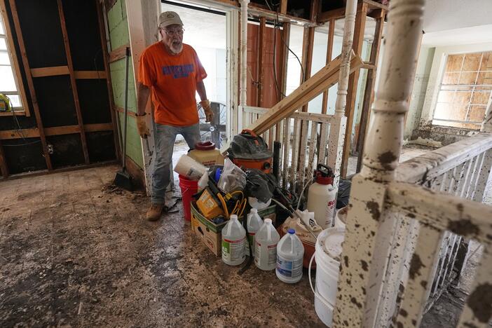 Homeowner Daniel Olivas walks through his home that was heavily damaged from flash floods along the Guadalupe River in Kerrville, Texas, on Thursday, July 10, 2025. Many home buyers in the U.S. do not get information about flood risk before them move in.