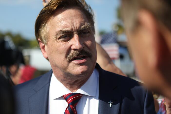 MyPillow CEO Mike Lindell arrives at a gathering of Donald Trump supporters near Trump's residence in Palm Beach, Fla., on April 4, 2023. On July 7, 2025, Lindell's lawyers were fined thousands of dollars for submitting a legal filing riddled with AI-generated mistakes.