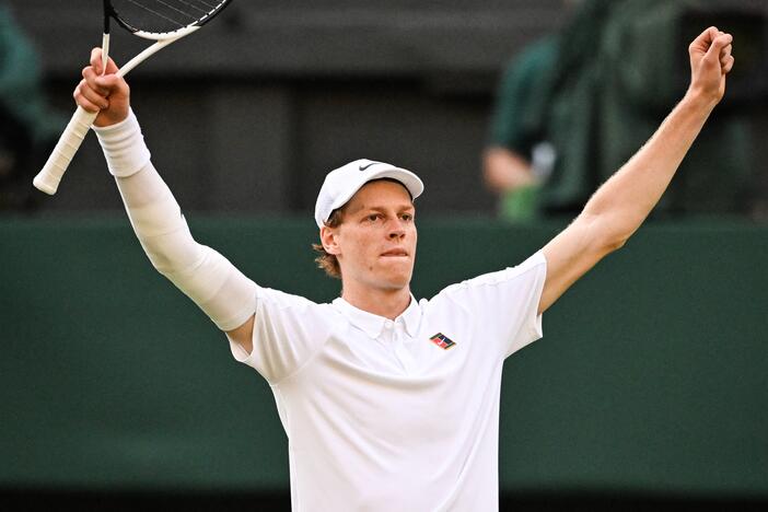 Italy's Jannik Sinner celebrates after victory against Spain's Carlos Alcaraz at Wimbledon, southwest London, on Sunday.