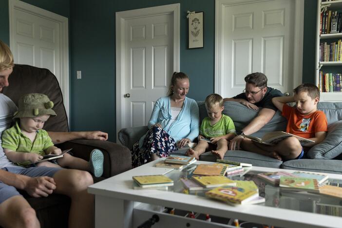 Megan and Stephen Alger, photographed at home with their children in Augusta, Georgia. They have eight children and are expecting their ninth in December.