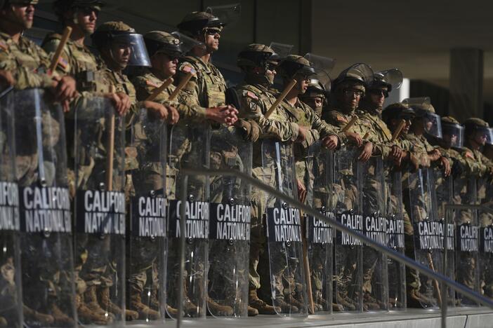 FILE - California National Guard are positioned at the Federal Building, June 10, 2025, in downtown Los Angeles.
