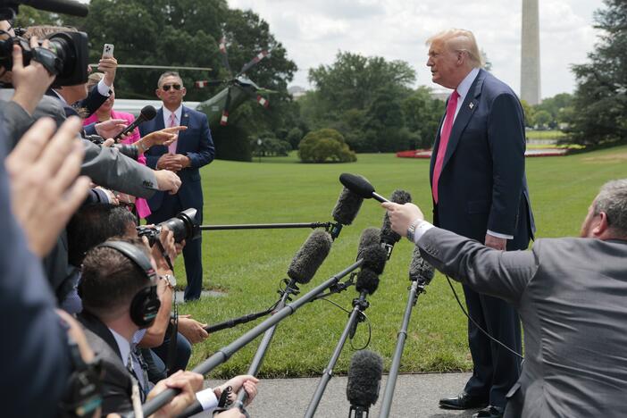 President Trump speaks to the media as he departs the White House on July 15 for Pittsburgh.