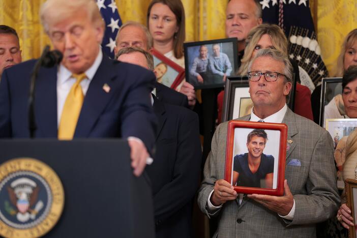 Greg Swan, whose son Drew died as a result of a fentanyl-related substance, looks on as President Trump speaks in the East Room of the White House. The president signed the HALT Fentanyl Act, which aims to permanently classify all fentanyl-related substances as schedule I controlled substances and aid law enforcement in prosecuting trafficking and manufacturing offenses.