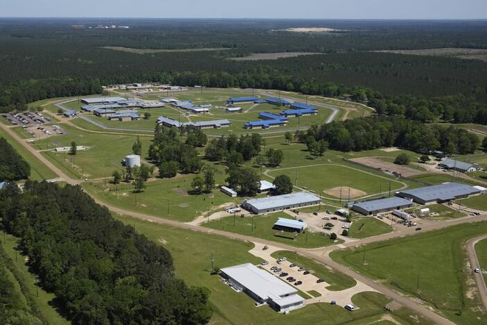 The EOIR (Executive Office For Immigration Review) Oakdale Immigration Court, bottom, is seen in this aerial photo from April in Oakdale, La.