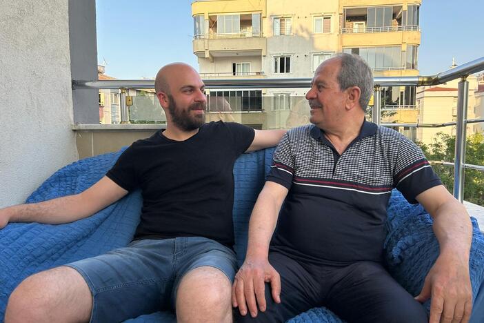 Adham Aljamous, 32, and his father Nouruldeen, 72, on their rooftop in Gaziantep, Turkey. They fled Syria over a decade ago. Now, with a chance to return, they're unsure what's left of home.