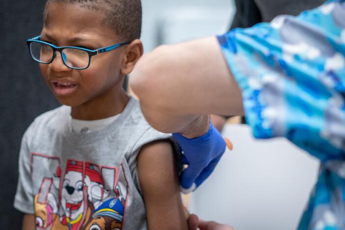 Xerius Jackson, age 7, gets an MMR vaccine at a clinic in Lubbock, Texas, on March 1, two months into a multistate outbreak of measles that began in January. During this time, Health and Human Services Secretary Robert F. Kennedy Jr. has made changes to how the federal government assesses vaccine recommendations.