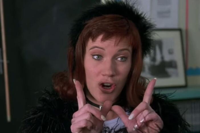 The 1995 teen movie <em>Clueless</em> popularized terms like "Whatever" — including the gesture — shown here in a still featuring Elisa Donovan as Amber.