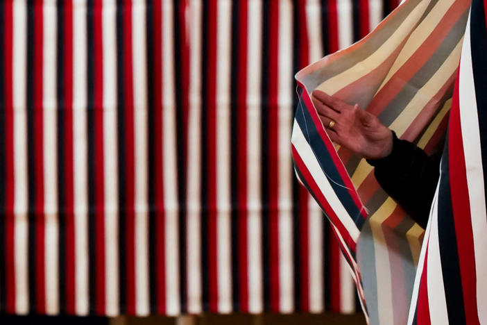 A voter walks at a polling place during the New Hampshire presidential primary election in Nashua, New Hampshire, on Jan. 23, 2024. Photo by Elizabeth Frantz/ Reuters