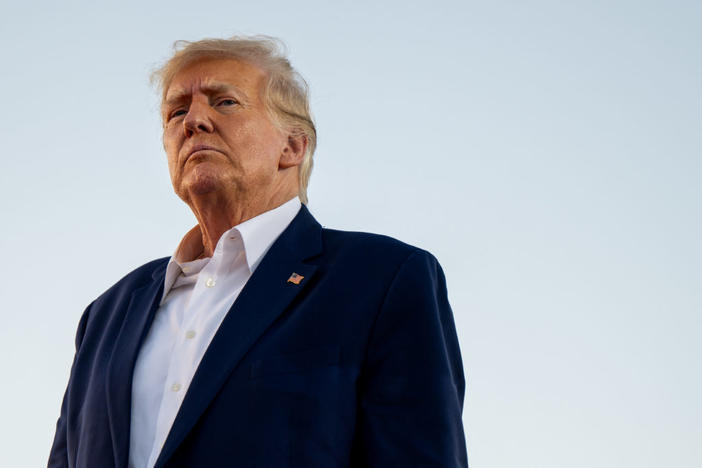 Former U.S. President Donald Trump looks on during a rally at the Waco Regional Airport on March 25, 2023 in Waco, Texas. Former U.S. president Donald Trump attended and spoke at his first rally since announcing his 2024 presidential campaign. Today in Waco also marks the 30 year anniversary of the weeks deadly standoff involving Branch Davidians and federal law enforcement. 82 Davidians were killed, and four agents left dead. (Photo by Brandon Bell/Getty Images)
