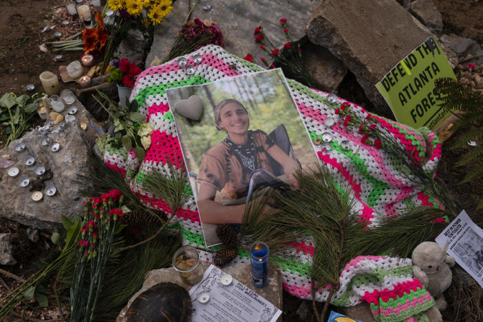 A photo of 26-year-old Tortuguita, who was shot and killed by a Georgia state trooper, is seen on a makeshift memorial in Weelaunee People's Park near Atlanta, Georgia, on Jan. 21, 2023. Photo by Elijah Nouvelage for The Washington Post/via Getty Images