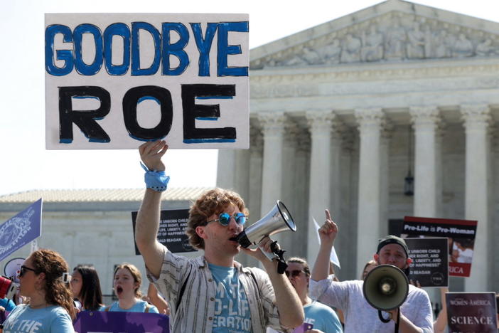 Anti-abortion activists demonstrate outside the Supreme Court of the United States in Washington, U.S., June 13, 2022. REUTERS/Evelyn Hockstein