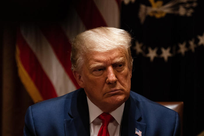 U.S. President Donald Trump listens during a meeting with members of the National Association of Police Organizations Leadership in the Cabinet Room of the White House July 31, 2020 in Washington, DC. Photo by Anna Moneymaker-Pool/Getty Images