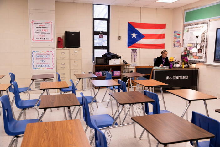 Ms. Leila E. Martinez, a Puerto Rican math teacher at Iroquois High School, teaches her class virtually from school after students have gone remote for a second week as cases of the Omicron coronavirus variant continue to surge and the untenable staffing numbers in schools in Louisville, Kentucky, U.S. January 21, 2022. REUTERS/Amira Karaoud