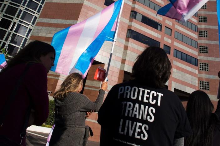 Members of the transgender and gender non-binary community and their allies gather to celebrate International Transgender Day of Visibility, March 31, 2017 at the Edward R. Roybal Federal Building in Los Angeles, California. International Transgender Day of Visibility is dedicated to celebrating transgender people and raising awareness of discrimination faced by transgender people worldwide. / AFP PHOTO / Robyn Beck (Photo credit should read ROBYN BECK/AFP via Getty Images)