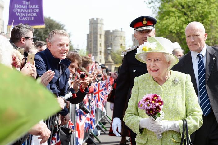 Britain's Queen Elizabeth walks through Windsor, England, on her 90th birthday on April 21, 2016. Photo by John Stillwell/Pool via Reuters