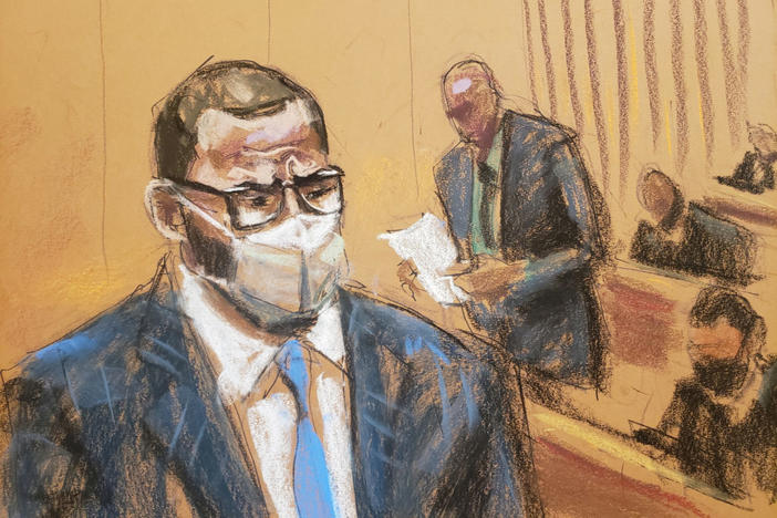 FILE PHOTO: R. Kelly sits as the jury foreman reads the guilty verdict in Kelly's sex abuse trial at Brooklyn's Federal District Court in a courtroom sketch in New York, U.S., Sep. 27, 2021. Jane Rosenberg/REUTERS