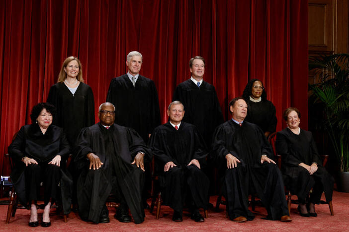 FILE PHOTO: U.S. Supreme Court justices pose for their group portrait at the Supreme Court in Washington, U.S., October 7, 2022. Seated (L-R): Justices Sonia Sotomayor, Clarence Thomas, Chief Justice John G. Roberts, Jr., Samuel A. Alito, Jr. and Elena Kagan. Standing (L-R): Justices Amy Coney Barrett, Neil M. Gorsuch, Brett M. Kavanaugh and Ketanji Brown Jackson. REUTERS/Evelyn Hockstein/File Photo