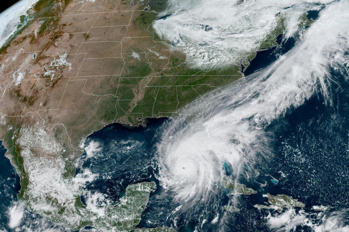 Hurricane Ian makes its way to Florida's west coast after passing Cuba in a composite image from the National Oceanic and Atmospheric Administration (NOAA) GOES-East weather satellite September 27, 2022. NOAA/Handout REUTERS THIS IMAGE HAS BEEN SUPPLIED BY A THIRD PARTY.