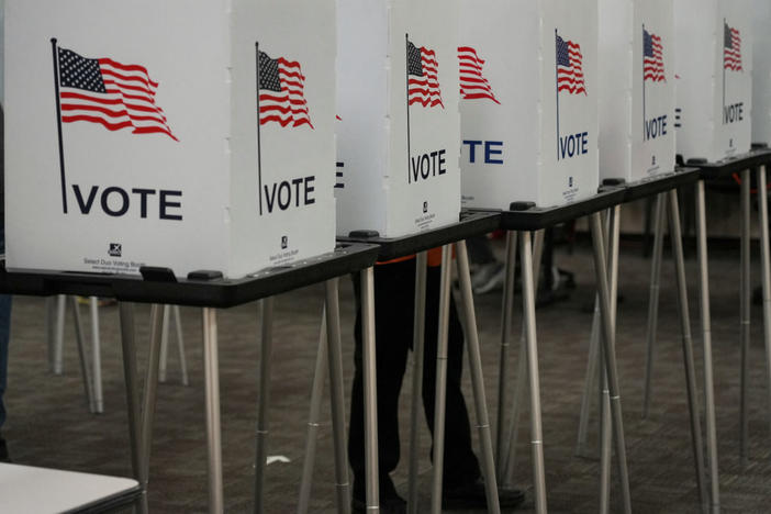Voting booths are pictured inside the Dona Ana County Government Center during early voting for the upcoming midterm elections in Las Cruces, New Mexico, U.S., October 24, 2022. REUTERS/Paul Ratje