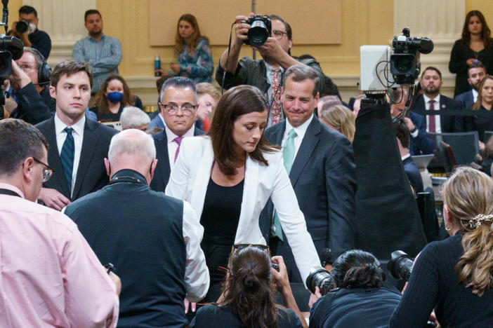 Cassidy Hutchinson, who was an aide to former White House Chief of Staff Mark Meadows during the administration of former U.S. President Donald Trump, stands up in a public hearing of the U.S. House Select Committee investigating the January 6 Attack on the U.S. Capitol, at the Capitol, in Washington, U.S., June 28, 2022. Photo by Mandel Ngan/Pool via REUTERS