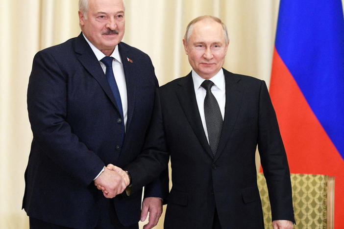 FILE PHOTO: Russian President Vladimir Putin shakes hands with Belarusian President Alexander Lukashenko during a meeting at the Novo-Ogaryovo state residence outside Moscow, Russia, Feb. 17, 2023. Photo by Vladimir Astapkovich/Sputnik/Kremlin via REUTERS