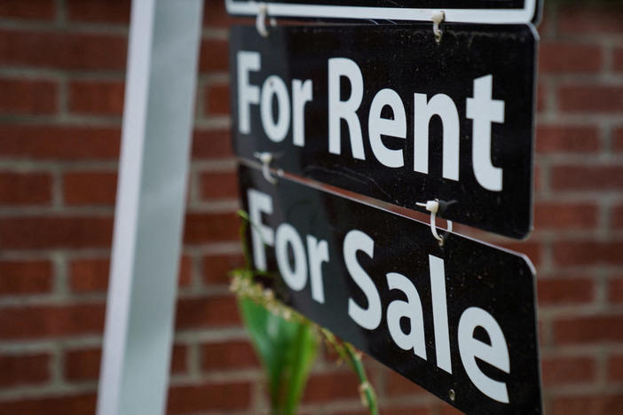FILE PHOTO: A "For Rent, For Sale" sign is seen outside of a home in Washington, U.S., July 7, 2022. REUTERS/Sarah Silbiger/File Photo
