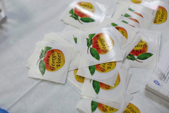 Stickers are available to voters after they cast their ballots at the Chastain Park Gymnasium during the Georgia Primary Election Day in Atlanta, Georgia, U.S. May 24, 2022. REUTERS/Alyssa Pointer