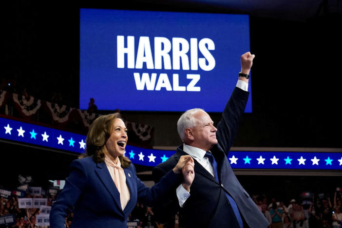U.S. Vice President and Democratic presidential candidate Kamala Harris and her newly chosen vice presidential running mate Minnesota Governor Tim Walz react as they hold a campaign rally in Philadelphia, Pennsylvania, U.S., August 6, 2024. Photo by Elizabeth Frantz/REUTERS