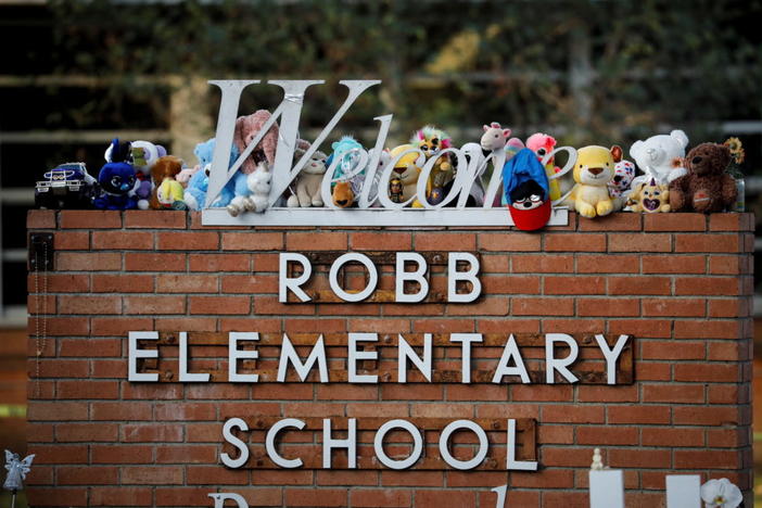 Toys are seen at a memorial outside Robb Elementary school, after a gunman killed nineteen children and two adults, in Uvalde, Texas, U.S. May 28, 2022. REUTERS/Marco Bello
