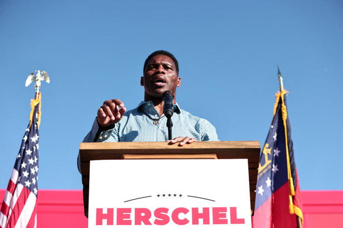 Republican candidate for U.S. Senate Herschel Walker rallies with supporters at a campaign stop in Newnan, Georgia, U.S. November 4, 2022. REUTERS/Dustin Chambers